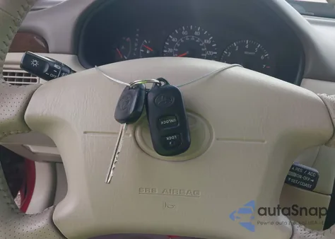 2001 Toyota Camry Solara Sle V6 z USA, uszkodzony, nr VIN 2T1CF22P51C440157